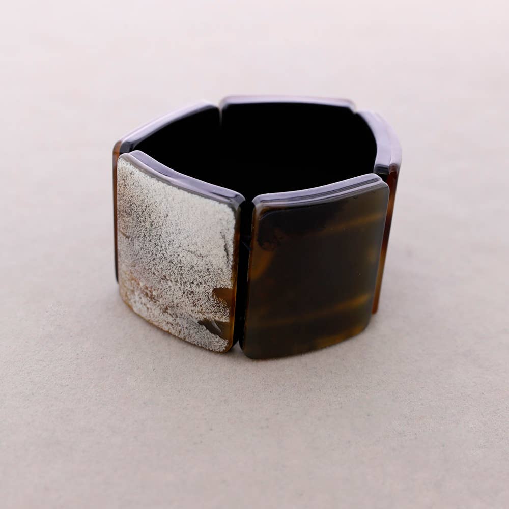 Pulsera elástica de cuentas de resina marrón · MHOSS Oviedo