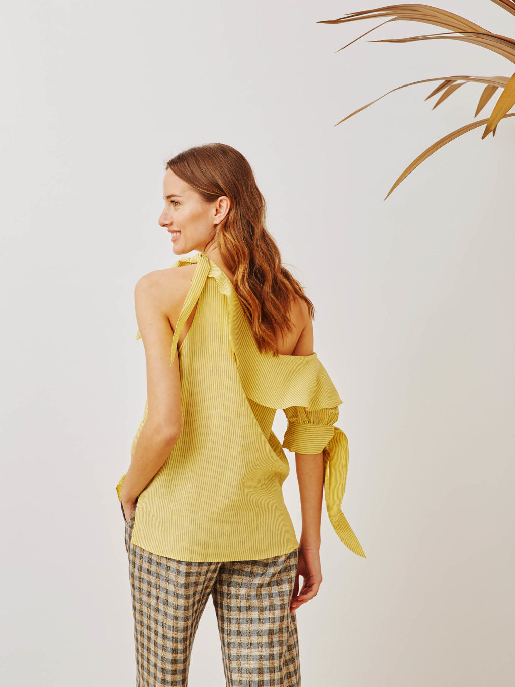 Top de rayas amarillo