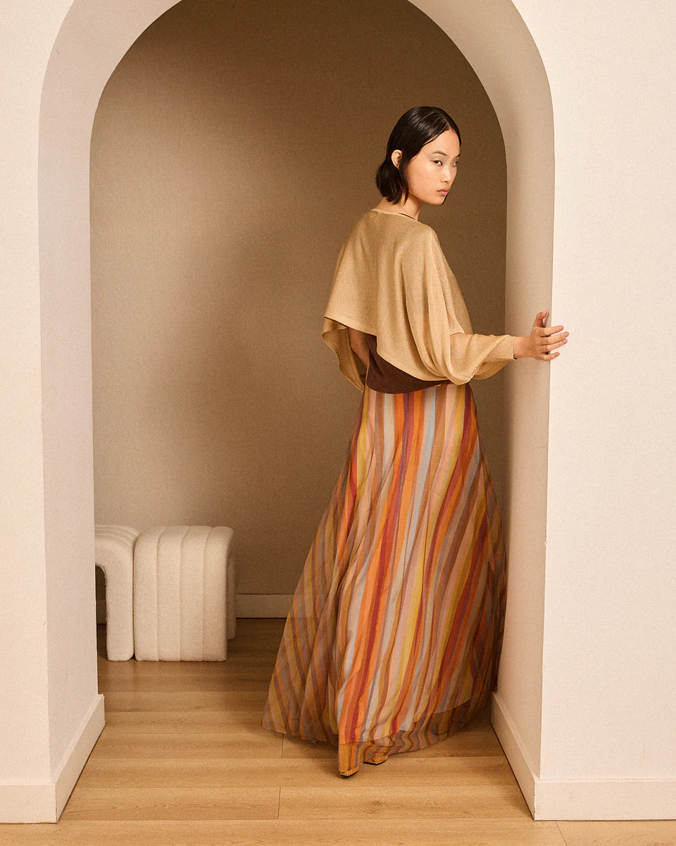 Poncho de lúrex dorado