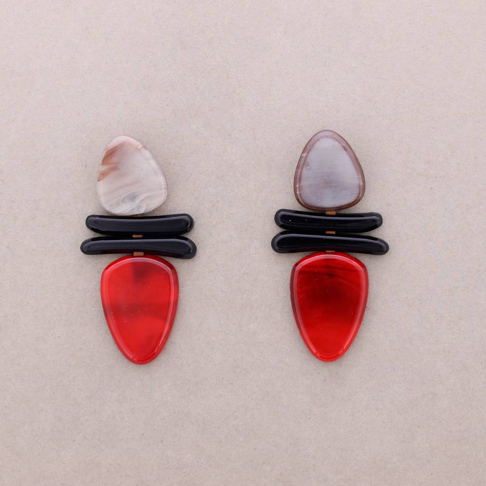 Detalle del brillo de los pendientes geométricos